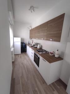 Kuchyň nebo kuchyňský kout v ubytování Residenza Gattoni