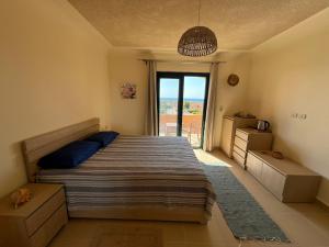 Postel nebo postele na pokoji v ubytování Art Home - La Hacienda, Ras Sudr
