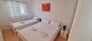 Postel nebo postele na pokoji v ubytování Apartment Sofia