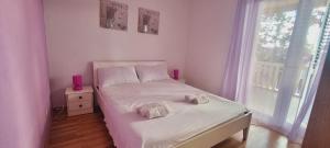 Postel nebo postele na pokoji v ubytování Apartment Sofia