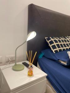 Postel nebo postele na pokoji v ubytování Apartamento de 1 Dormitorio con cochera - Dpto 507 + 6 fotografií
