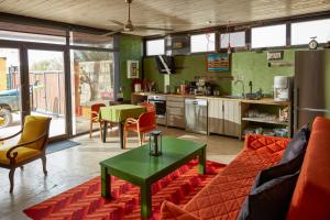 a living room with a couch and a table at Sunset No: 23 in Ovacık