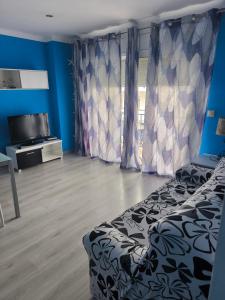 Χώρος καθιστικού στο Apartamento 50 metros del mar