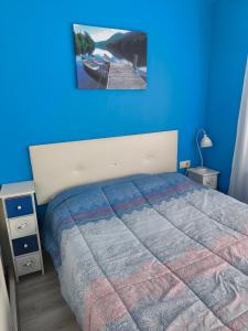 Ένα ή περισσότερα κρεβάτια σε δωμάτιο στο Apartamento 50 metros del mar