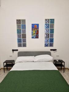 Posteľ alebo postele v izbe v ubytovaní Casa della Lettera