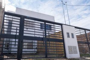 a large building with black and white windows at Dúplex Nuevo - Salta Capital in Salta
