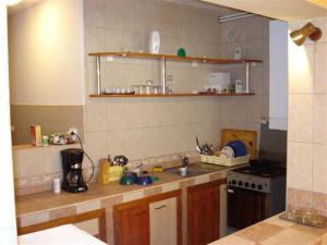 Kuchyň nebo kuchyňský kout v ubytování Casa Enescu