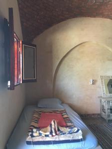Postel nebo postele na pokoji v ubytování Oum House Siwa