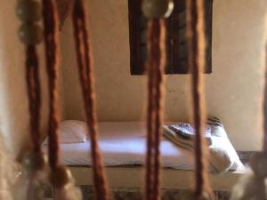 Postel nebo postele na pokoji v ubytování Oum House Siwa