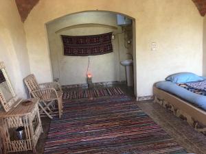 Postel nebo postele na pokoji v ubytování Oum House Siwa