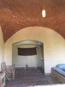 Postel nebo postele na pokoji v ubytování Oum House Siwa