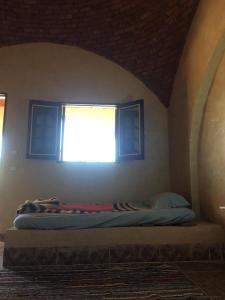 Postel nebo postele na pokoji v ubytování Oum House Siwa