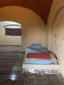 Postel nebo postele na pokoji v ubytování Oum House Siwa