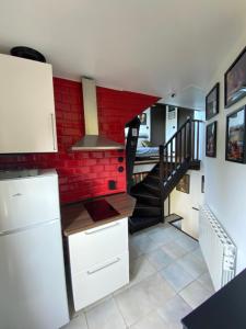 Η κουζίνα ή μικρή κουζίνα στο The Gallery - Cozy Apartment