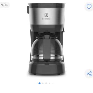 a black coffee maker on a white background at Pôr do sol 300 metros do centro in Pato Branco