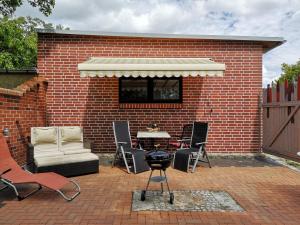 Patio nebo venkovní prostory v ubytování Ferienwohnung im Vogelhaus mit Dachterasse und großem Garten