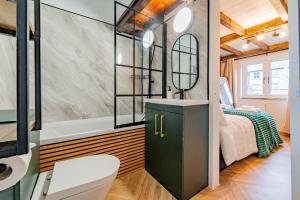 Koupelna v ubytování Cosy Cottage-tiny house + 21 fotografií