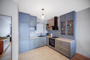 Kuchyň nebo kuchyňský kout v ubytování Apartament Jana 14 z garażem podziemnym + 2 fotografie