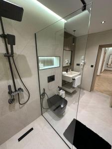 a bathroom with a shower and a sink at Centrico 6 Confort & Luxe au Centre in Tangier +14 photos