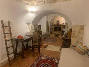 Posezení v ubytování Trulli Santa Maria Odegitria Relais