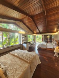 Ένα ή περισσότερα κρεβάτια σε δωμάτιο στο Luxury Family Beach Penthouse with Mountain Views +76 φωτογραφίες
