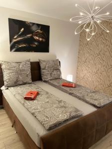 Postel nebo postele na pokoji v ubytování Anelia City Apartment 2 Zimmer inkl 2 Parkplätze im Zentrum + 22 fotografií