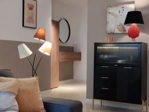 TV a/nebo společenská místnost v ubytování Loft Nel Borgo