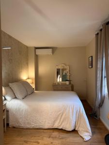 Postel nebo postele na pokoji v ubytování Bastide Aïna SPA et piscine