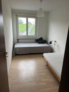 Postel nebo postele na pokoji v ubytování Wohnung Felix