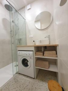 Koupelna v ubytování Appartement Ô Arcades + 37 fotografií