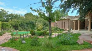 Κήπος έξω από το Villa Toscana