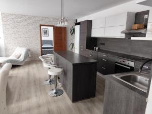 Kuchyň nebo kuchyňský kout v ubytování Apartmán pod věží