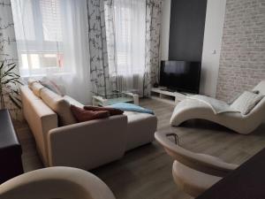 Posezení v ubytování Apartmán pod věží