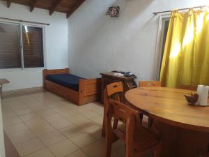 Ένα ή περισσότερα κρεβάτια σε δωμάτιο στο El refugio - Cuatro Horizontes