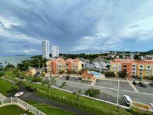 a view of a city with buildings and a street at Ocean & Marina Views 3 Bedroom 2 Bathroom Luxury Condo in Fajardo
