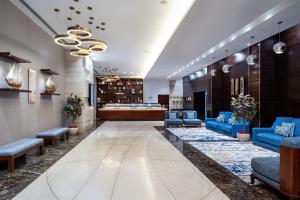 Area soggiorno di Four Points by Sheraton Sharjah