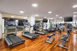 a gym with a bunch of exercise equipment in it at Sheraton Salta Hotel in Salta