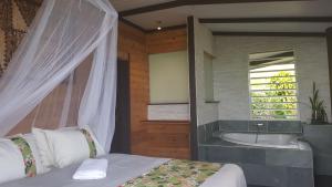 Φωτογραφία από το άλμπουμ του Villa Heinani lodge Puunui σε Tohautu