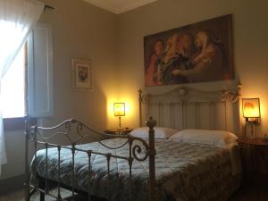 A bed or beds in a room at Campo alle Monache