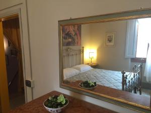 A bed or beds in a room at Campo alle Monache