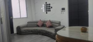 a living room with a couch and a table at Apto 8-32 in Santa Rosa de Cabal