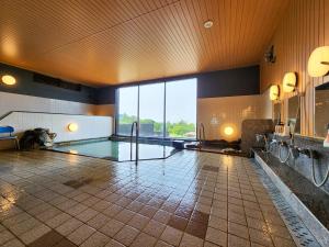 Bazén v ubytování Iwanai Kogen Hotel nebo v jeho okolí