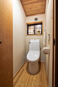 a bathroom with a white toilet in a room at Connect inn Kyoto-Gojo in Kyoto