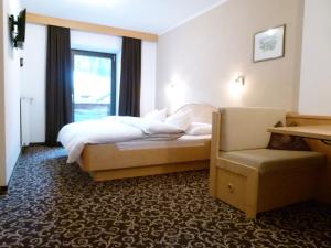 Postel nebo postele na pokoji v ubytování Hotel Stocker