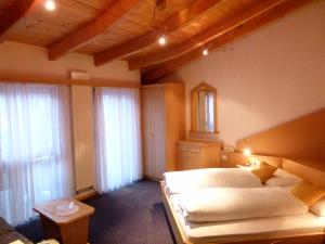 Postel nebo postele na pokoji v ubytování Hotel Stocker