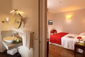 Postel nebo postele na pokoji v ubytování Vivaldi Luxury Rooms