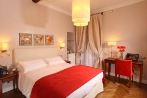 Postel nebo postele na pokoji v ubytování Vivaldi Luxury Rooms