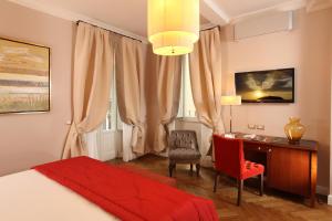 Postel nebo postele na pokoji v ubytování Vivaldi Luxury Rooms