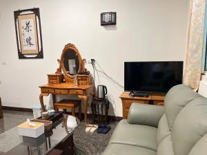 TV tai viihdekeskus majoituspaikassa 天隆民宿Tian Long Tea Farm HomeStay