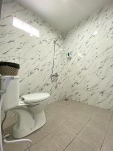 Ένα μπάνιο στο Petik Merah Beo